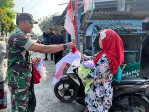 Semarak Menyambut HUT RI ke-80, Koramil dan Forkopimcam Kemusu Bagikan Bendera Merah Putih