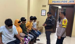 Polisi, Amankan Lima Penyebar Hoaks Naiknya Air Laut, Saat Musibah Banjir, Masyarakat Di Imbau Tetap Tenang.